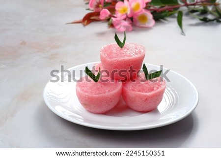 Kue mangkok or kue apem.steamed cupcakes or Fa Gao are special cakes during Chinese New Year celebrations. Fa Gao is believed to be a fortune cake. Royalty-Free Stock Photo #2245150351