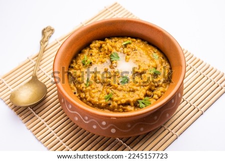 Millet Khichdi or bajra khichadi is a one pot healthy and protein rich gluten-free Indian meal Royalty-Free Stock Photo #2245157723