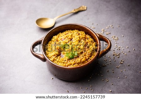 Millet Khichdi or bajra khichadi is a one pot healthy and protein rich gluten-free Indian meal Royalty-Free Stock Photo #2245157739