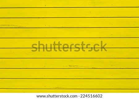 yellow wooden wall gives a harmonic pattern