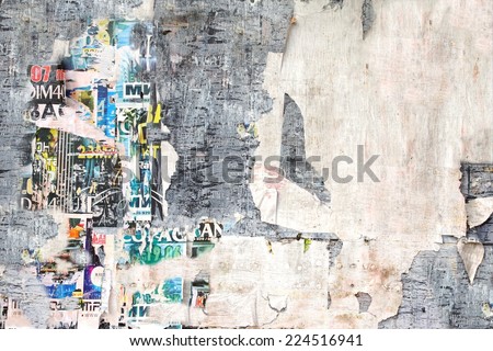 Old Billboard with Torn Posters. Background and Texture for text or image