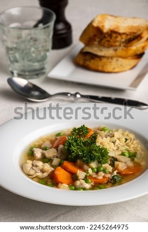 overview of chicken soup with bread