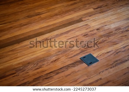 Wooden surface, floor, texture. Power outlet space, modern architecture, physical space, interior design, brown. Sophisticated.