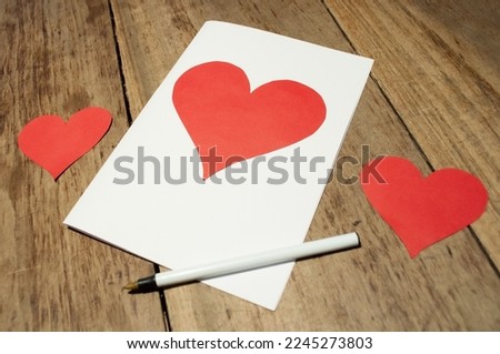 romantic heart shape red plain valentines day card to be handwritten as a gift to show love and affection for a specific person who they adore during the yearly special day
