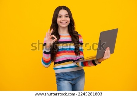 Back to school, Teenager school girl with laptop computer. Happy teenager, positive and smiling emotions of teen schoolgirl.