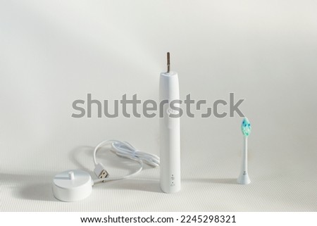 Electric sonic toothbrush isolated on white background