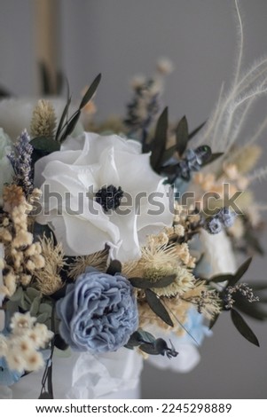 Gently white anemones, green roses and cream peonies with eucalyptus. Composition in white box. Floristics preserved flowers. Mmother's day, valentine's day, Woman's day 8 march.