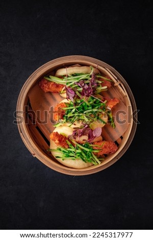 Delicious spanish food, dishes on a dark background in a restaurant, tasty looking dishes Royalty-Free Stock Photo #2245317977