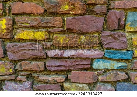 Old red brick and stone wall cement texture