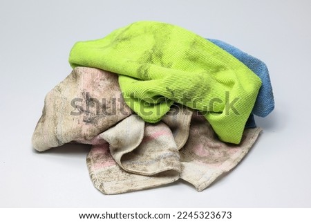 Pile of dirty rag suspended isolated on white background. Royalty-Free Stock Photo #2245323673