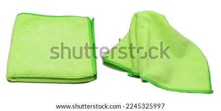 New green micro fiber cloths for cleaning work isolated on white background. Royalty-Free Stock Photo #2245325997