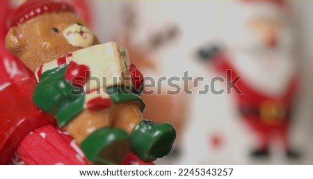 beautiful bear christmas napkin ring red green color reading book with bokeh