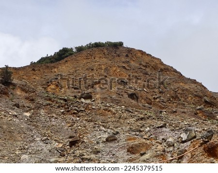 rock structures with various types and colors at the top of the crater of Mount Papandayan, West Java