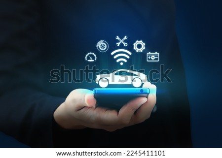 Intelligent car app on smartphone concept, Car app connect, a smart car companion, conveys the idea of an intelligent mobile app for cars. Car service app alert. Royalty-Free Stock Photo #2245411101