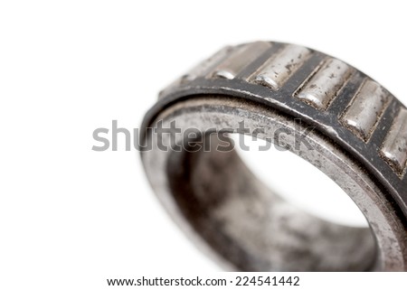 old roller bearing with traces rust, isolated on white background.