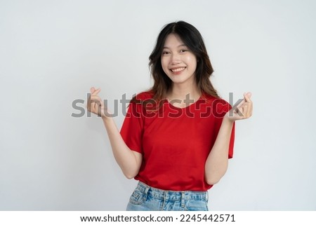 Asian long hair black beautiful woman feeling very happy Excited hand gesture and amazed. Studio portrait isolated on white background.