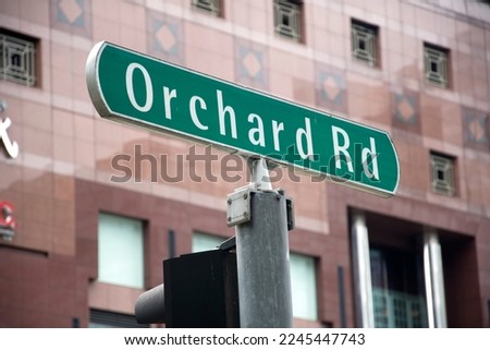 Close up shot of Orchard Road sign as seen in Singapore at daytime.