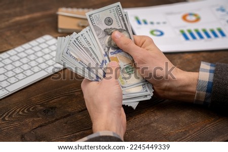 lot of money in the hands of a businessman