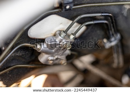 Car brake distributor proportion valve. selective focus Royalty-Free Stock Photo #2245449437