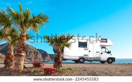 Family travel,  holiday road trip in motorhome ( sea, palm tree, beach) Andalusia in Spain Royalty-Free Stock Photo #2245455583