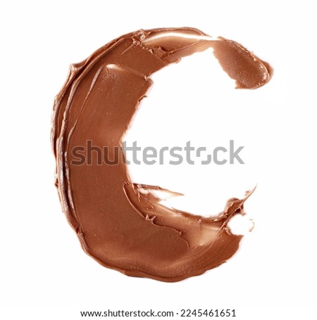 Cream chocolate spreading in shape letter C, alphabet isolated on white, clipping path, top view