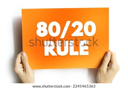 80 20 Rule - The Pareto principle states that for many outcomes, roughly 80% of consequences come from 20% of causes, text concept on card Royalty-Free Stock Photo #2245465363