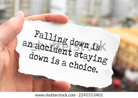 Inspiring motivation quote with text Falling down is an accident staying down is a choice.