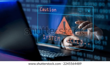 A computer popup box screen warning of a system being hacked, System hacked alert after cyber attack on computer network. internet virus cyber security and cybercrime. hackers to steal the information Royalty-Free Stock Photo #2245564489