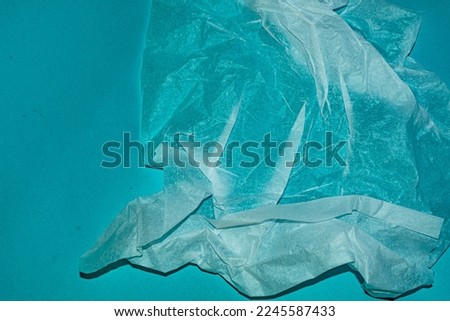 blue crumpled paper texture with strokes, background, design of winter season, abstract surrealism, with a picture, abstract blue acrylic texture background