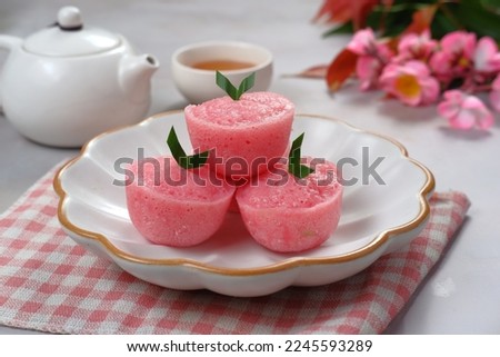 Kue mangkok or kue apem.steamed cupcakes or Fa Gao are special cakes during Chinese New Year celebrations. Fa Gao is believed to be a fortune cake Royalty-Free Stock Photo #2245593289