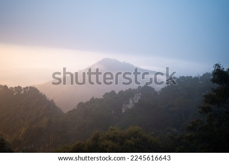 view of  sea of cloud with a mountain and hill ,Sunset at Angkang ,Chiang Mai, Thailand.