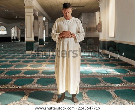 Man, muslim faith and praying in mosque for God, peace and mindfulness with traditional islamic clothes. Islam worship, prayer and spiritual balance for ramadan, religion and gratitude in Doha, Qatar