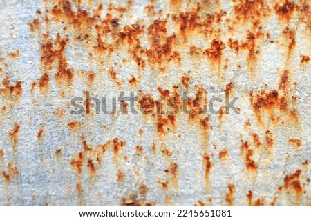 The surface of the old iron has rusted and peeled off. Rust stains on galvanized. Abstract background for decorative and work design.