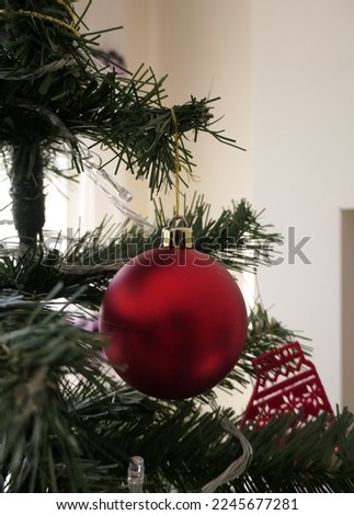 Red christmas ball on the christmas tree