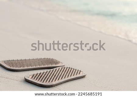 sadhu boards stand on a sandy seashore, the concept of yoga practice, meditation. selective focus