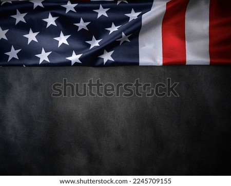 USA flag on a dark background. American flag element on a black background. Patriotic concept.