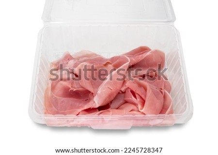 Sliced parma cooked ham in transparent food plastic tray for sale isolated on white
