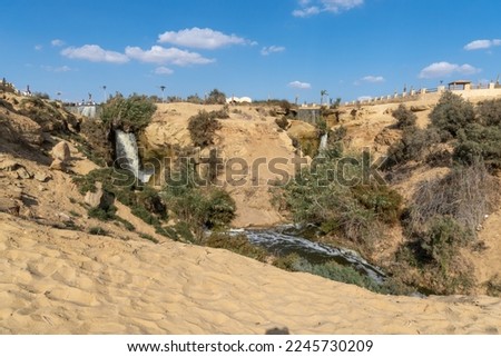 Fayoum oasis waterfall on a sunny day. Royalty-Free Stock Photo #2245730209