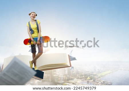 Beautiful young girl with skate board