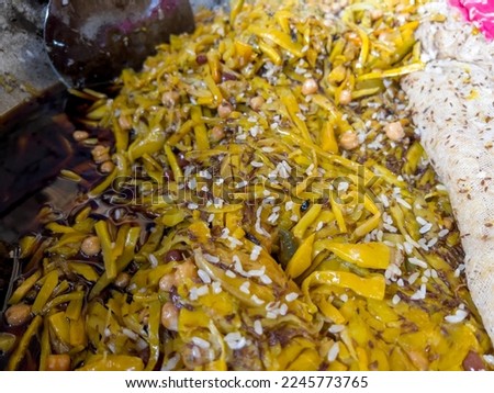The main ingredients of plov: rice, carrots, chickpeas, cumin and raisins.