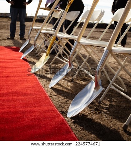 Construction ground breaking ceremony with red carpet