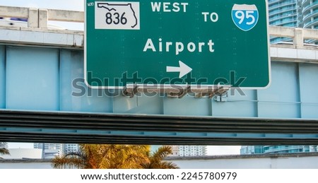 Airport directions. Interstate sign along the streets