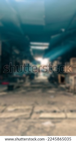 Blur photo of a flea market selling motorcycle parts