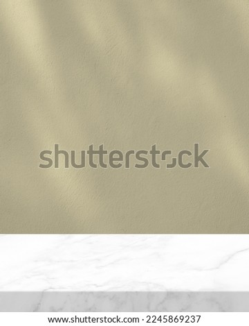 White Marble Table with Tree Shadow on Beige Concrete Background in Social Media Image Size, Suitable for Product Photography Backdrop, Display, and Mock up.