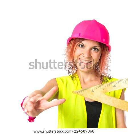 Worker woman with bevel over white background