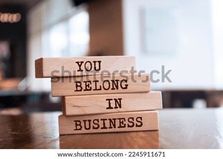 Wooden blocks with words 'You belong in business'. Business concept