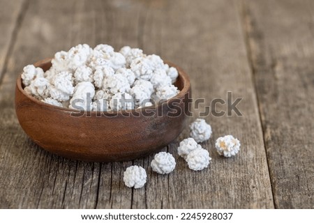 White sugar coated roasted chickpeas, turkish traditional nuts, round small confectionery