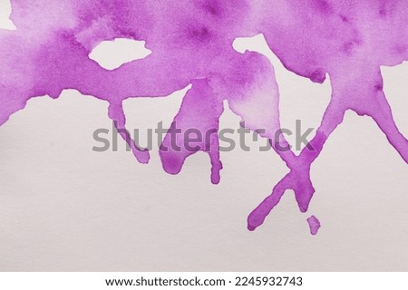 Purple watercolor blots on white canvas, top view. Space for text
