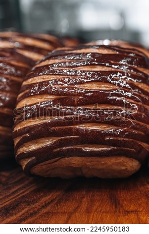 Sweet fresh pastries with chocolate icing