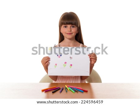 cute little gir with a picture in his hands. isolated on white background
